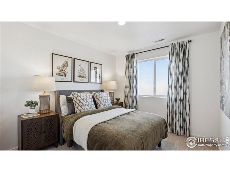 Furnished interior view inside a new home in Villas at Vantage, Berthoud (Image 13).