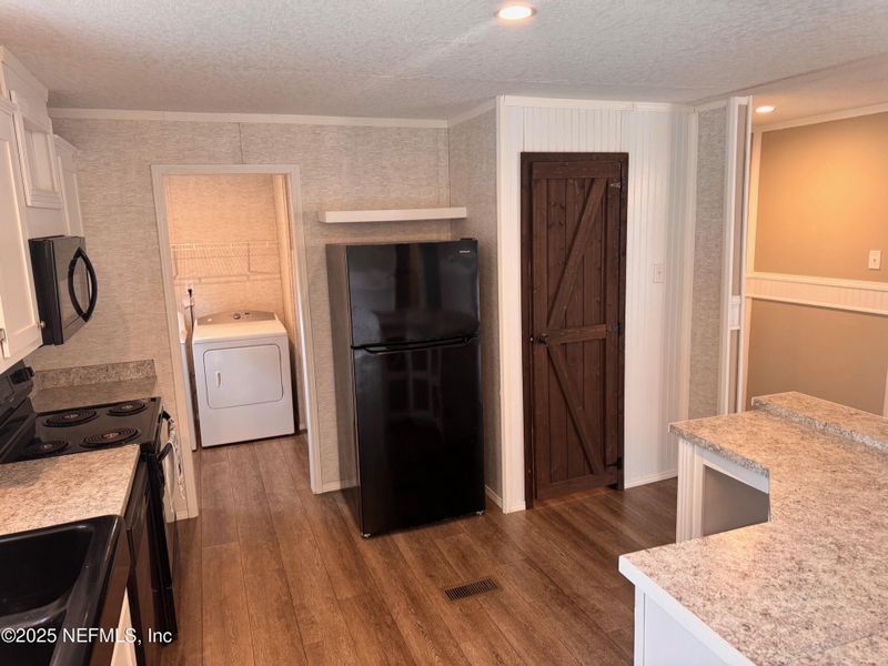 Furnished interior view inside a new home in , Fernandina Beach (Image 4).