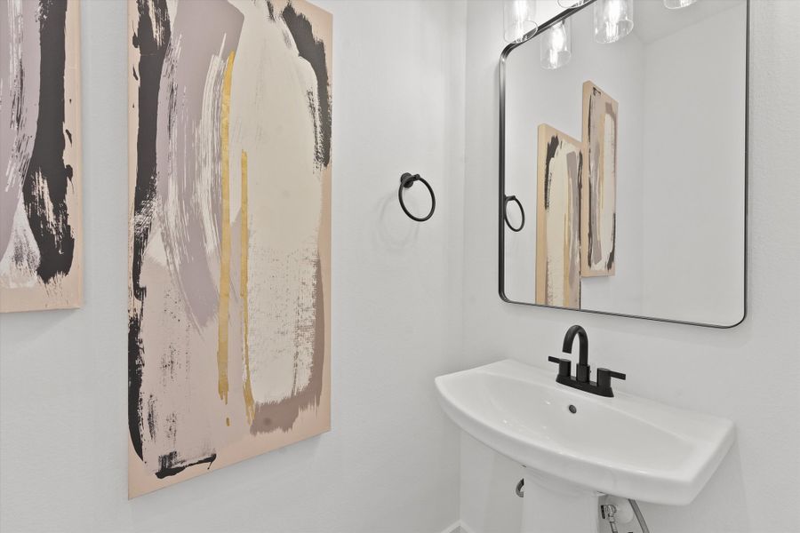 Representative furnished interior of a home built from the 1616 by Zoom Homes in Bauman Landing, Houston (Image 6).