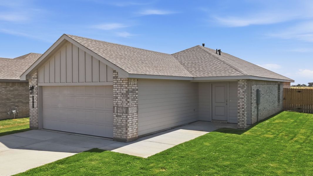 Front exterior of a new home in Terra Vista, Lubbock, TX, highlighting curb appeal (Image 2). Front exterior of a new home in Terra Vista, Lubbock, TX, highlighting curb appeal (Image 2).