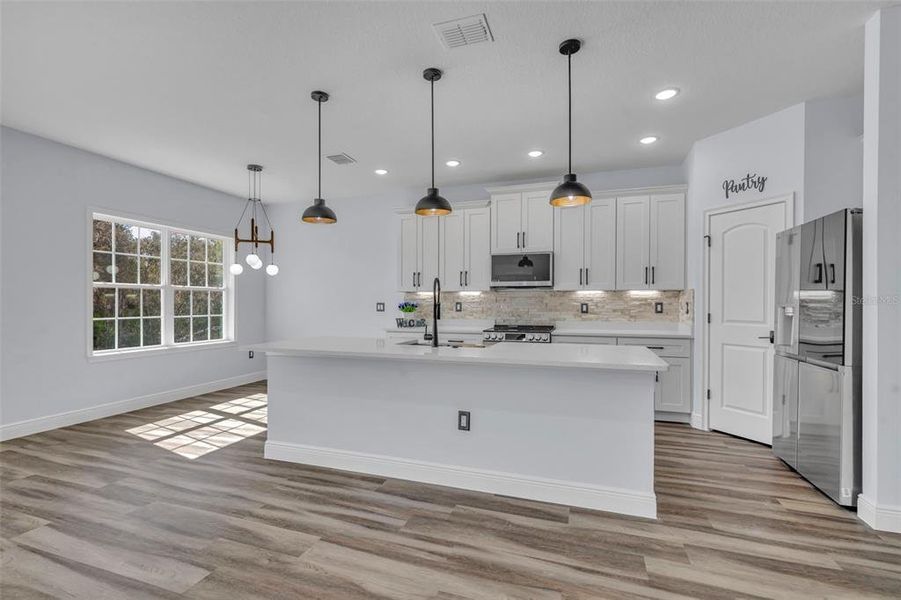 Furnished interior view inside a new home in , Poinciana (Image 11). Furnished interior view inside a new home in , Poinciana (Image 11).