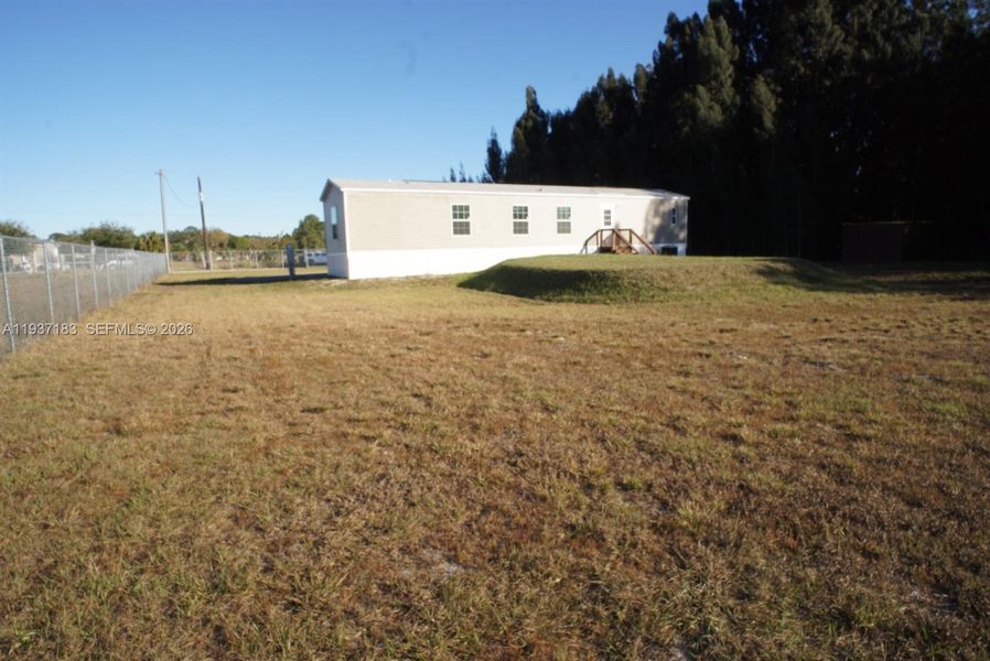 Exterior details and patio area of a home in , Clewiston (Image 2). Exterior details and patio area of a home in , Clewiston (Image 2).