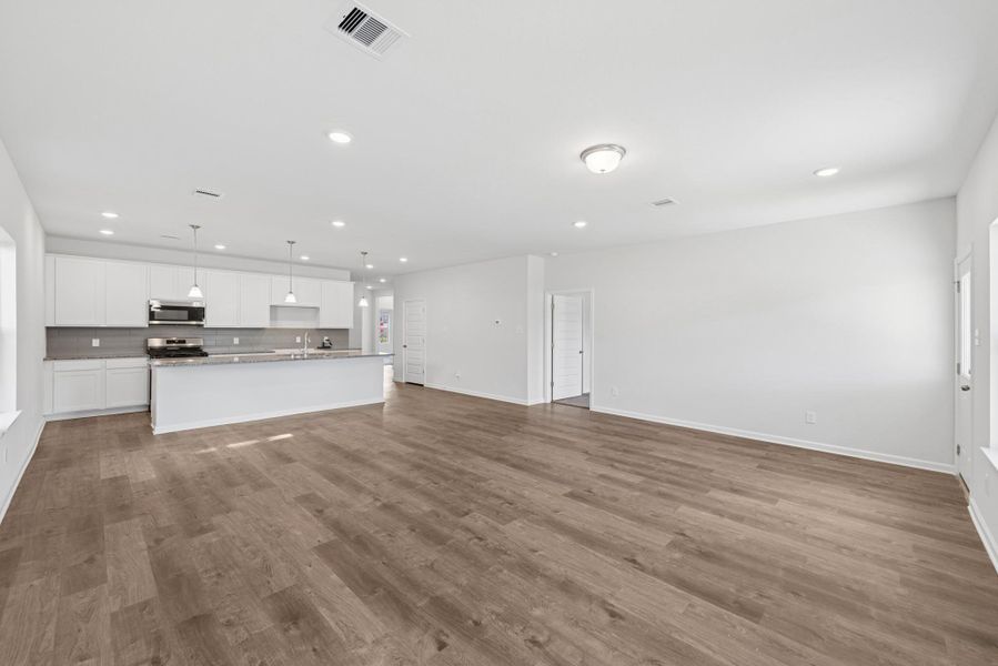 The Crawford- Family Room into Kitchen The Crawford- Family Room into Kitchen
