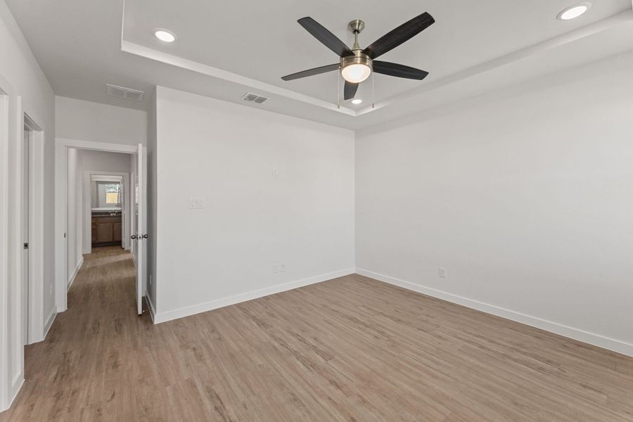 Representative unfurnished interior of a home built from the Clovis by Hakes Brothers in Hunters Ranch, San Antonio (Image 18).