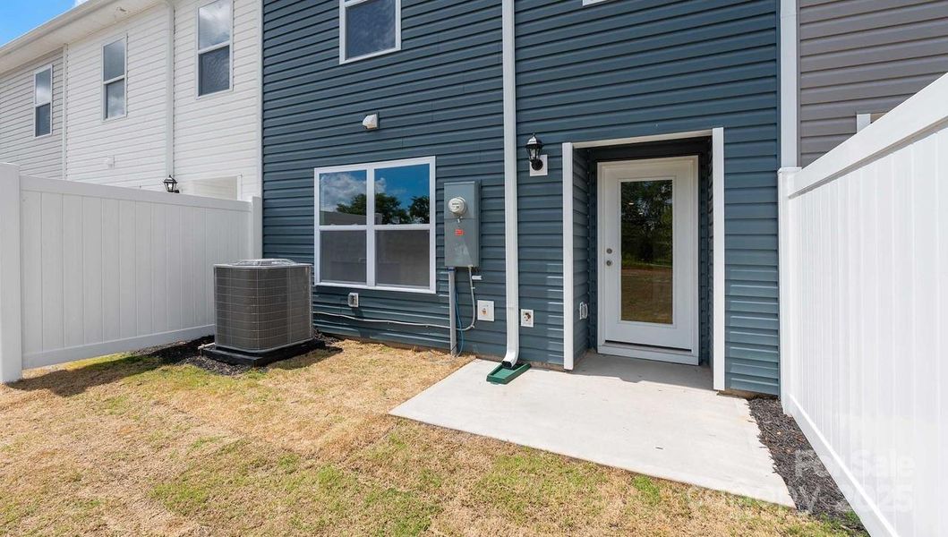 Front exterior of a new home in Clark Creek Landing Townhomes, Lincolnton, NC, highlighting curb appeal (Image 17).