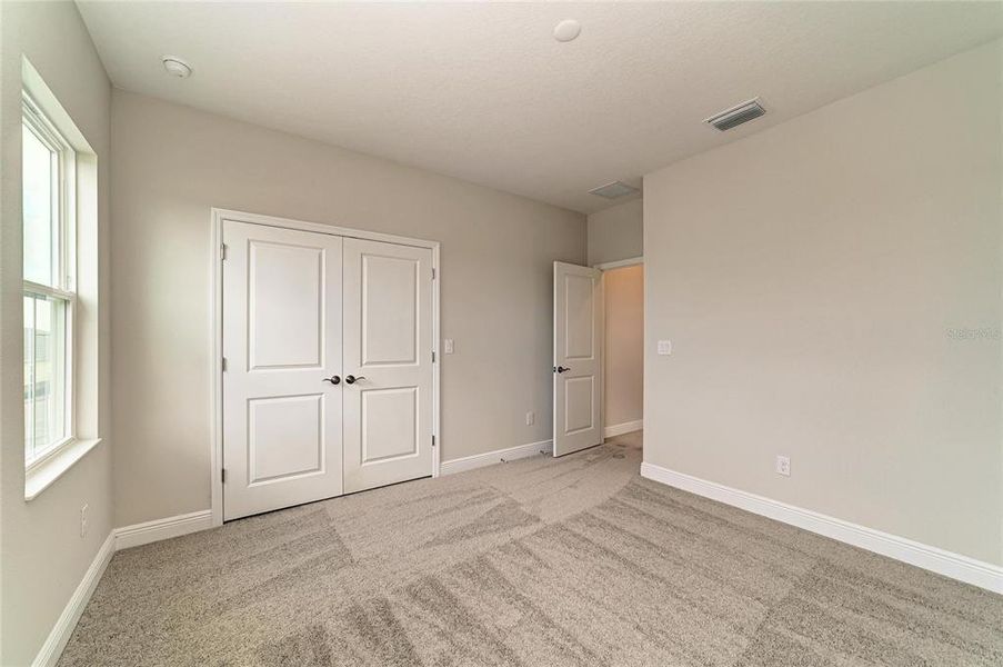 Spacious, unfurnished interior of a new home in North River Ranch, Parrish (Image 41).
