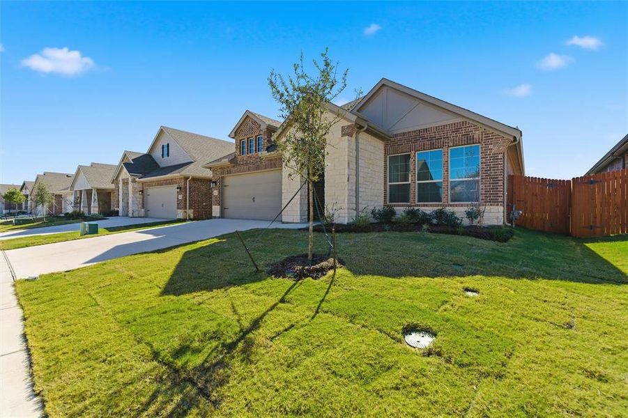 Front exterior of a new home in Northstar, Haslet, TX, highlighting curb appeal (Image 1).