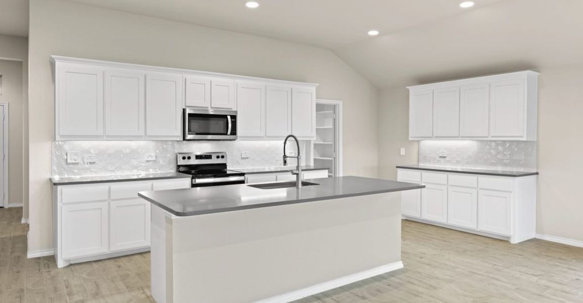 Representative exterior photo of a completed home built from the Lincoln by Impression Homes in Keeneland, Aubrey, TX (Image 5). Representative exterior photo of a completed home built from the Lincoln by Impression Homes in Keeneland, Aubrey, TX (Image 5).