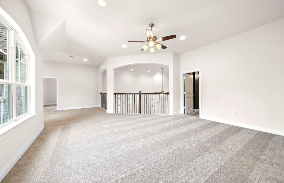 Representative unfurnished interior of a home built from the 4094 by Ravenna Homes in Artavia 70′, Conroe (Image 55).