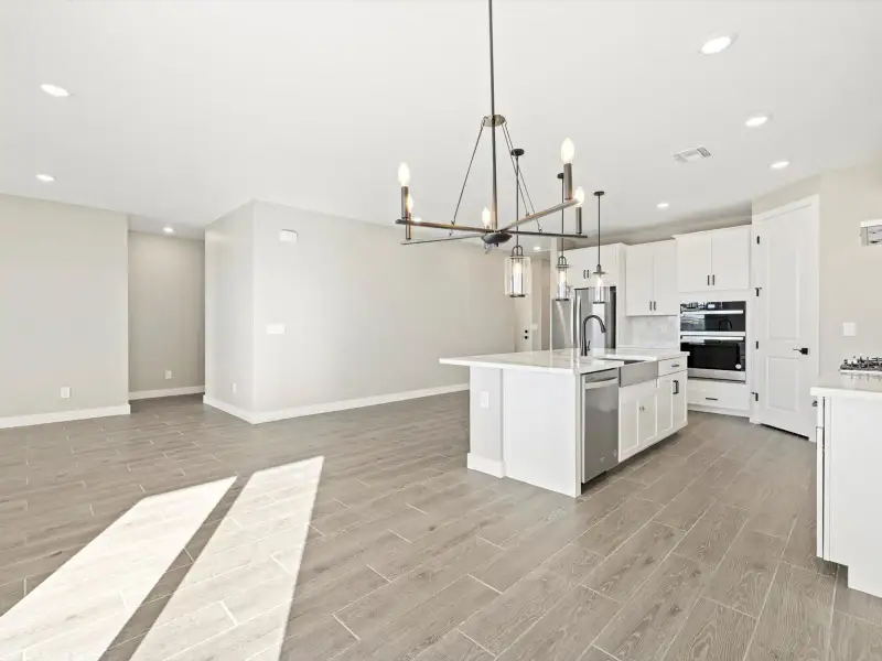Spacious, unfurnished interior of a new home in White Tank Foothills Reserve Series, Waddell (Image 10). Spacious, unfurnished interior of a new home in White Tank Foothills Reserve Series, Waddell (Image 10).