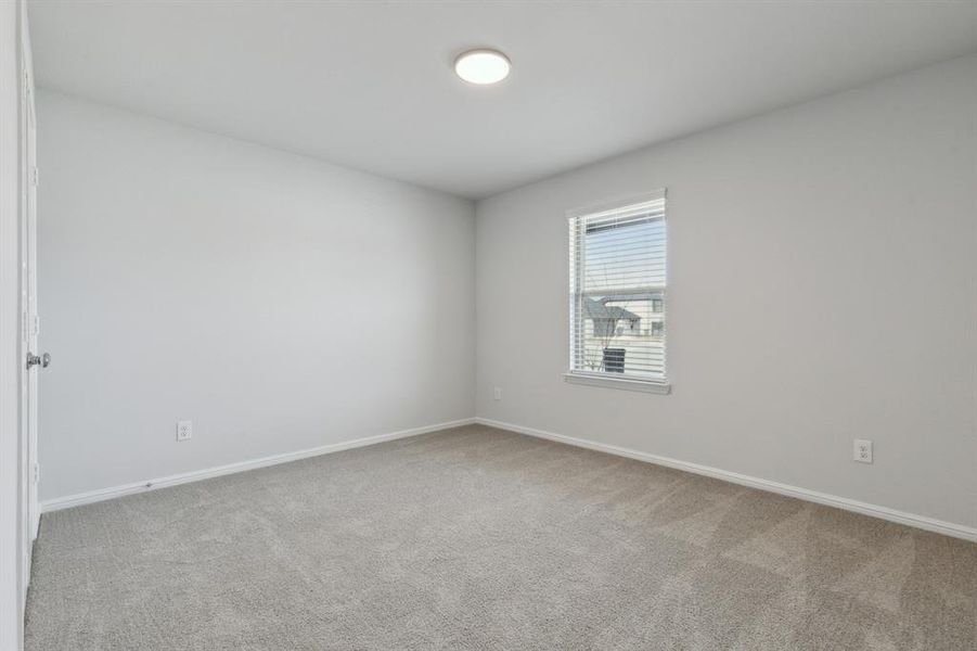 Bedroom in the Hayden home plan by Trophy Signature Homes – REPRESENTATIVE PHOTO Bedroom in the Hayden home plan by Trophy Signature Homes – REPRESENTATIVE PHOTO