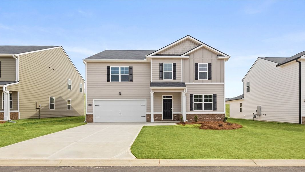 Front exterior of a new home in The Abbey at Trolley Run Station, Aiken, SC, highlighting curb appeal (Image 1).