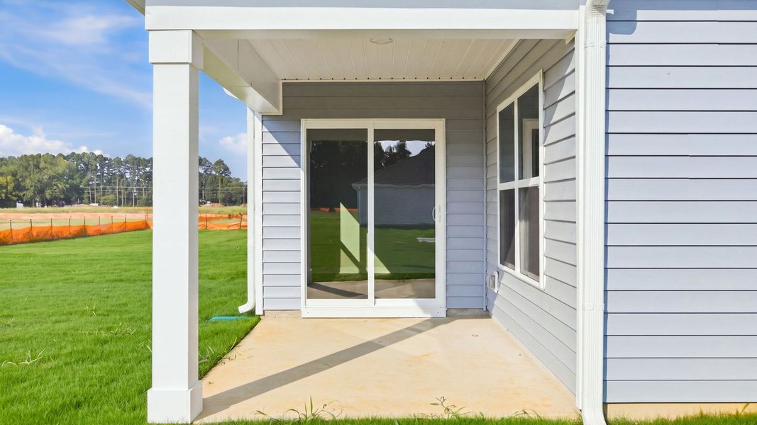 Exterior details and patio area of a home in Bynum Farms, Farmville (Image 19). Exterior details and patio area of a home in Bynum Farms, Farmville (Image 19).
