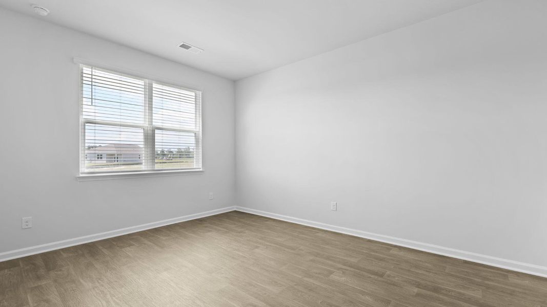 Spacious, unfurnished interior of a new home in The Ranch, Holly Hill (Image 24).