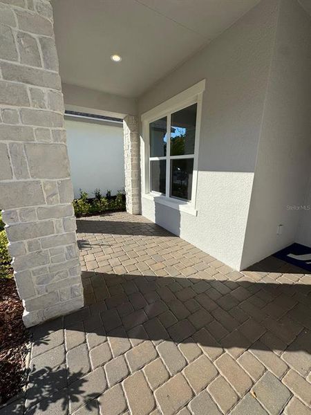 Exterior details and patio area of a home in Ridgehaven, Ormond Beach (Image 3).