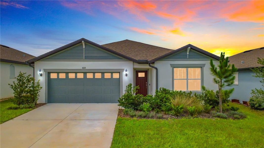 Front exterior of a new home in Lake Alfred Pines, Lake Alfred, FL, highlighting curb appeal (Image 23).