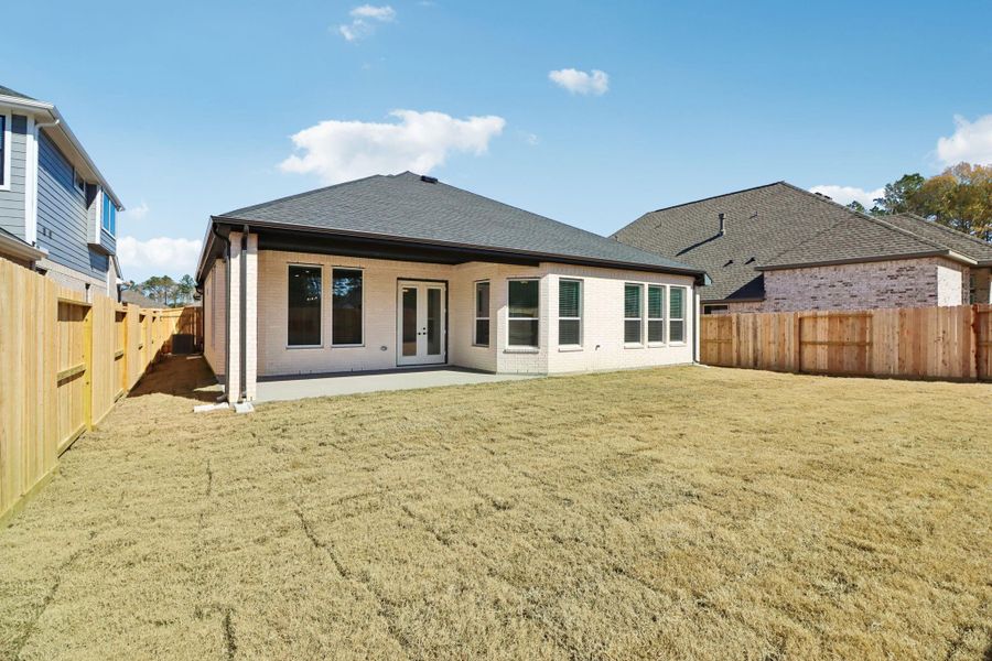 Exterior details and patio area of a home in The Highlands, Porter (Image 3).