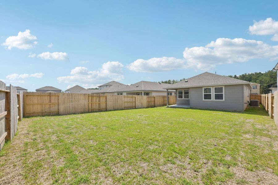 Front exterior of a new home in Landing Meadows - Traditional Series, New Caney, TX, highlighting curb appeal (Image 2).