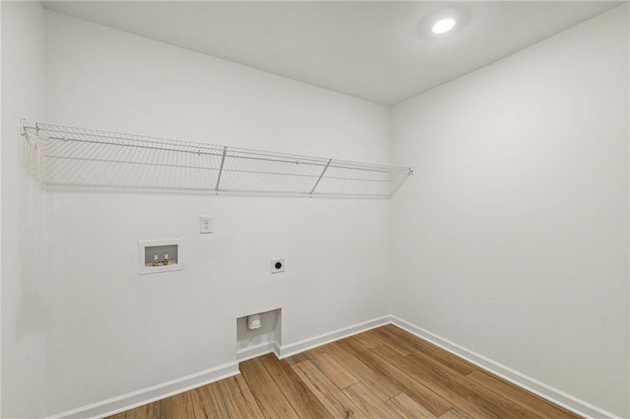 Spacious, unfurnished interior of a new home in Eastlyn Crossing, Flowery Branch (Image 29).
