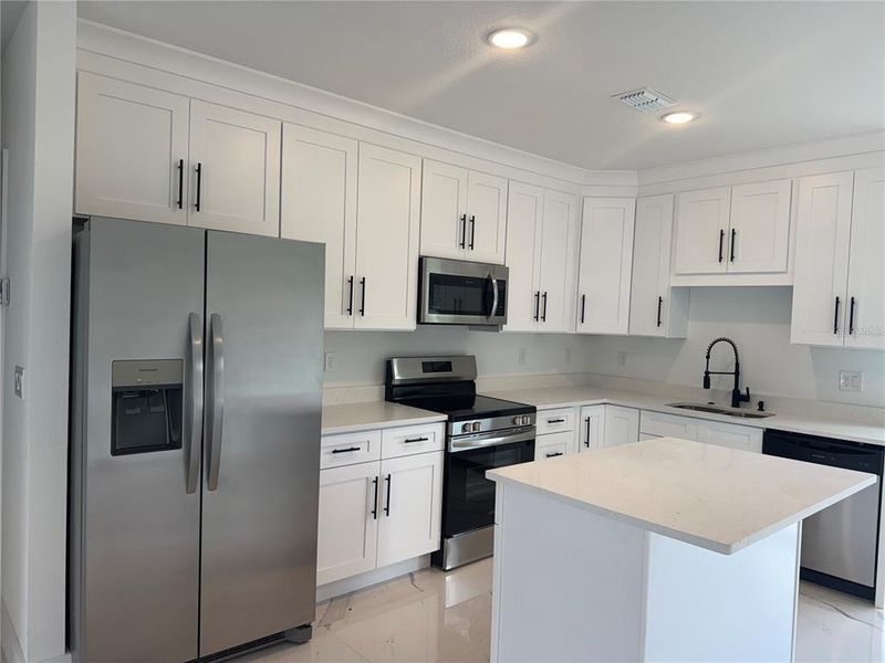 Furnished interior view inside a new home in , Dunnellon (Image 4).