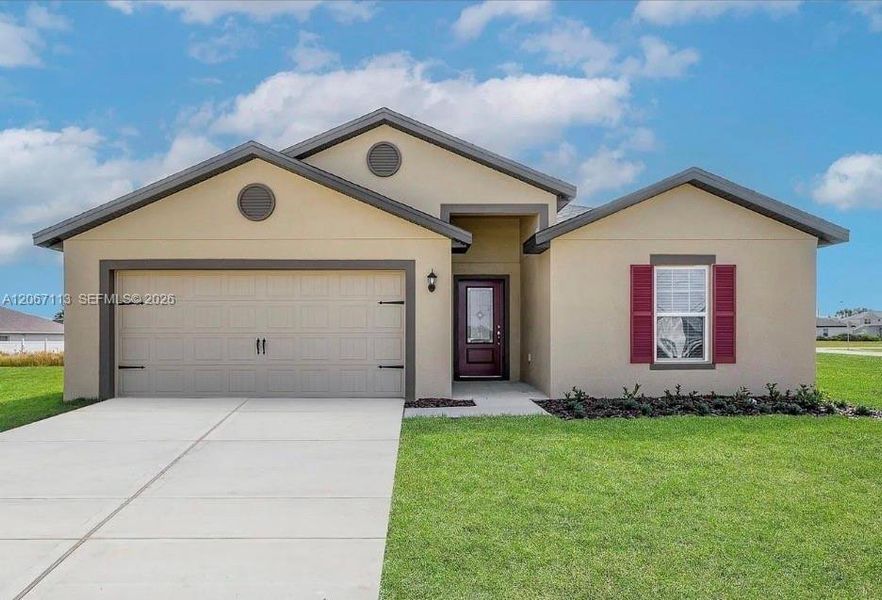 Front exterior of a new home in , Port St. Lucie, FL, highlighting curb appeal (Image 20). Front exterior of a new home in , Port St. Lucie, FL, highlighting curb appeal (Image 20).