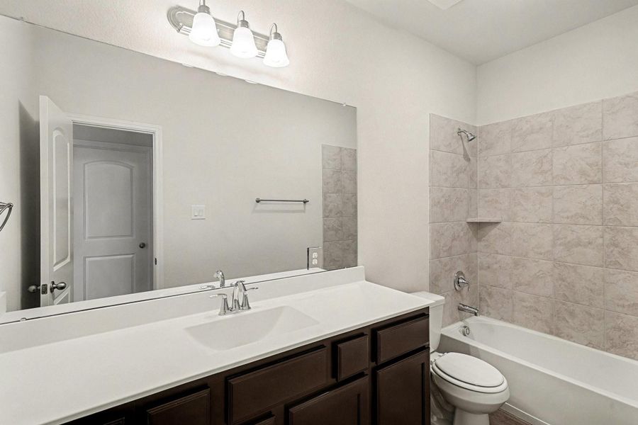 Furnished interior view inside a new home in Clear View Estates, Willis (Image 7).