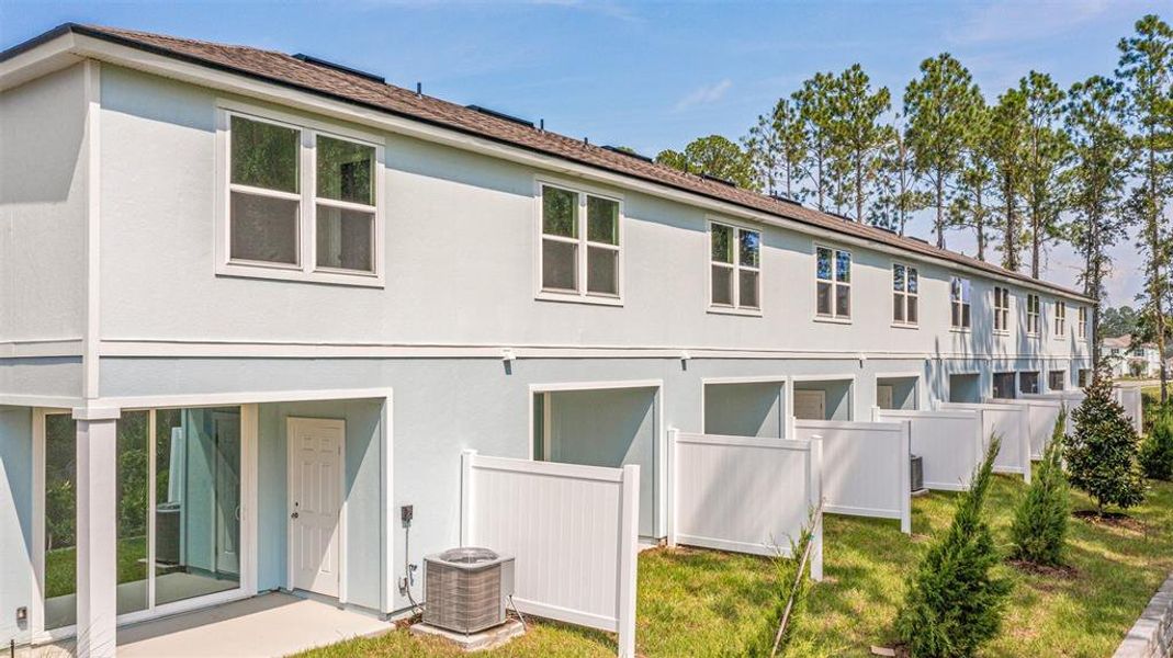 Front exterior of a new home in Stokes Landing, St. Augustine, FL, highlighting curb appeal (Image 19).