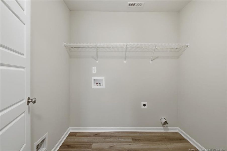 Laundry room off of garage entrance