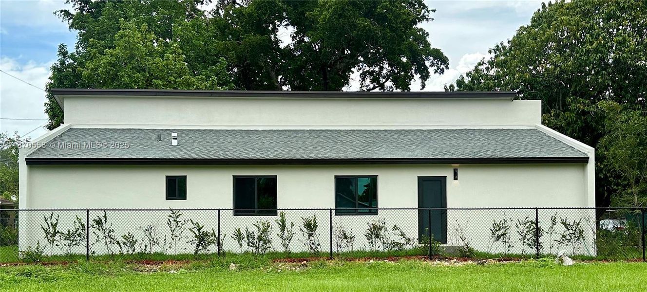 Front exterior of a new home in , Miami, FL, highlighting curb appeal (Image 32).