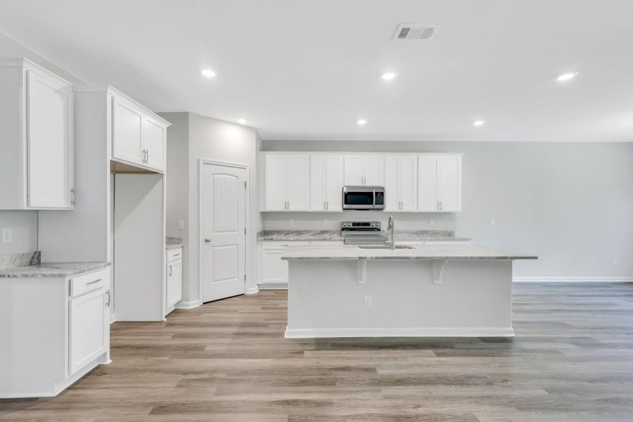 Representative furnished interior of a home built from the The Dublin by Smith Family Homes in Settlers Hammock, Kingsland (Image 13).