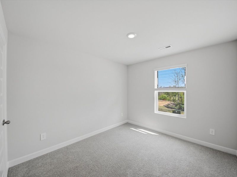 Spacious, unfurnished interior of a new home in Crossing at Abner Creek Townes, Greer (Image 20).