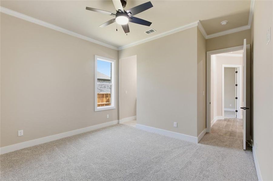 Light-colored carpeting complementing neutral wall tones