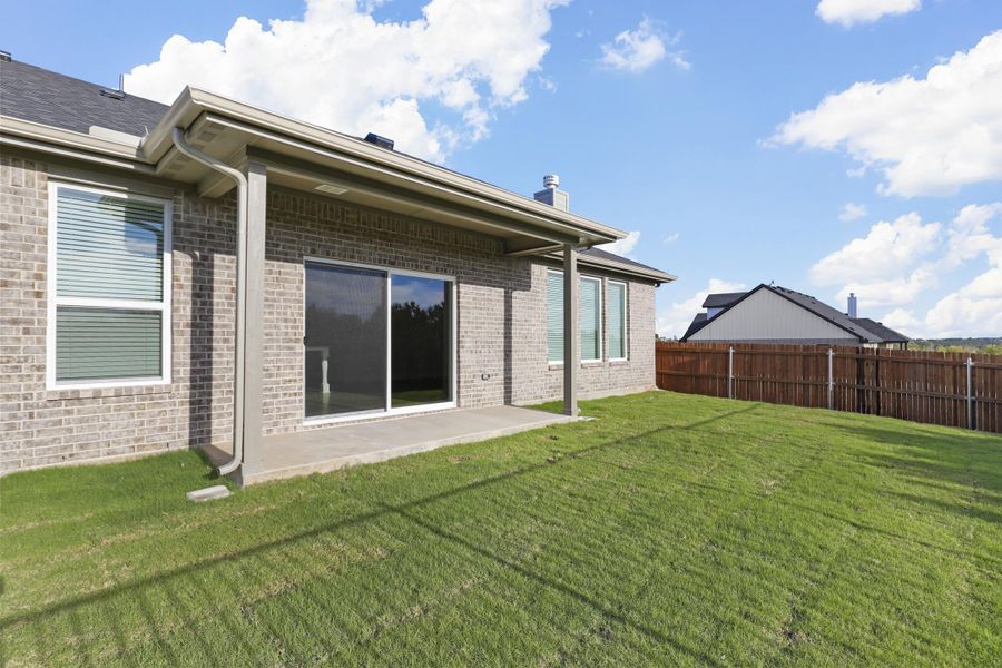 Representative exterior photo of a completed home built from the Garrison I by Cheldan Homes in Stoneview, Glen Rose, TX (Image 31).