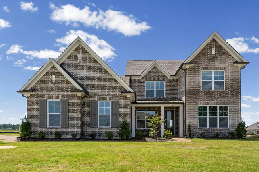 Front exterior of a new home in White Oak, Arlington, TN, highlighting curb appeal (Image 1). Front exterior of a new home in White Oak, Arlington, TN, highlighting curb appeal (Image 1).