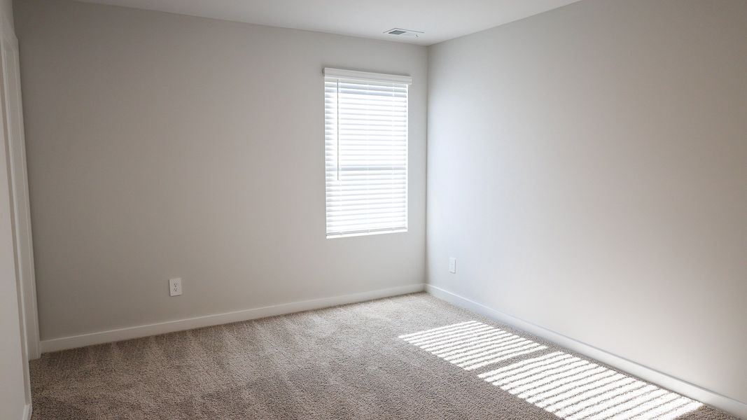 Representative unfurnished interior of a home built from the EMBRY by D.R. Horton in Harvest Point, Spring Hill (Image 45).