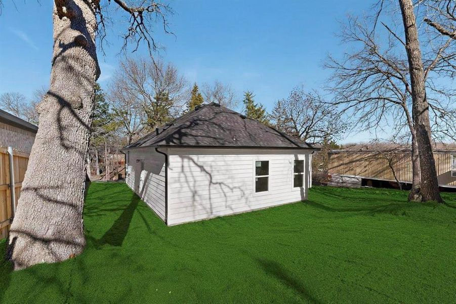 Exterior details and patio area of a home in , Denison (Image 3).