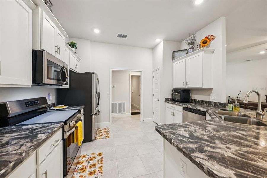 Furnished interior view inside a new home in Oaks at Ocala Crossings, Ocala (Image 13).