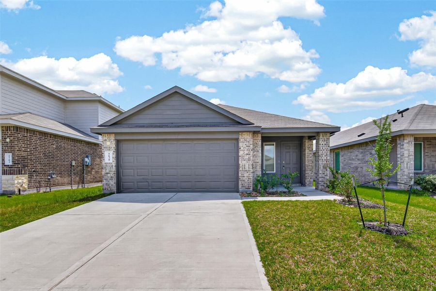 Front exterior of a new home in Breckenridge Forest, Spring, TX, highlighting curb appeal (Image 22).