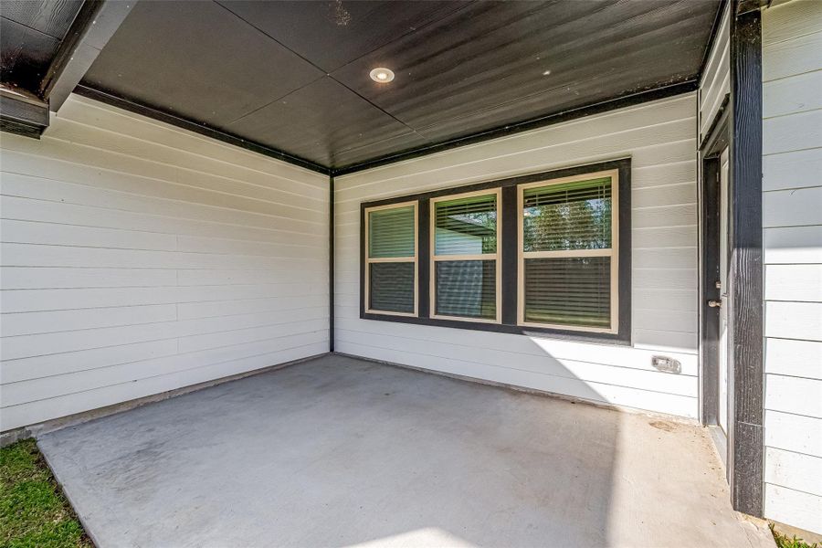 Exterior details and patio area of a home in Splendora Fields, Splendora (Image 31).