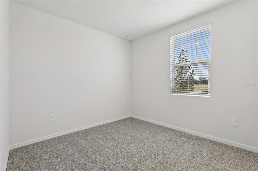 Spacious, unfurnished interior of a new home in Bradbury Creek - Signature Series, Haines City (Image 18).