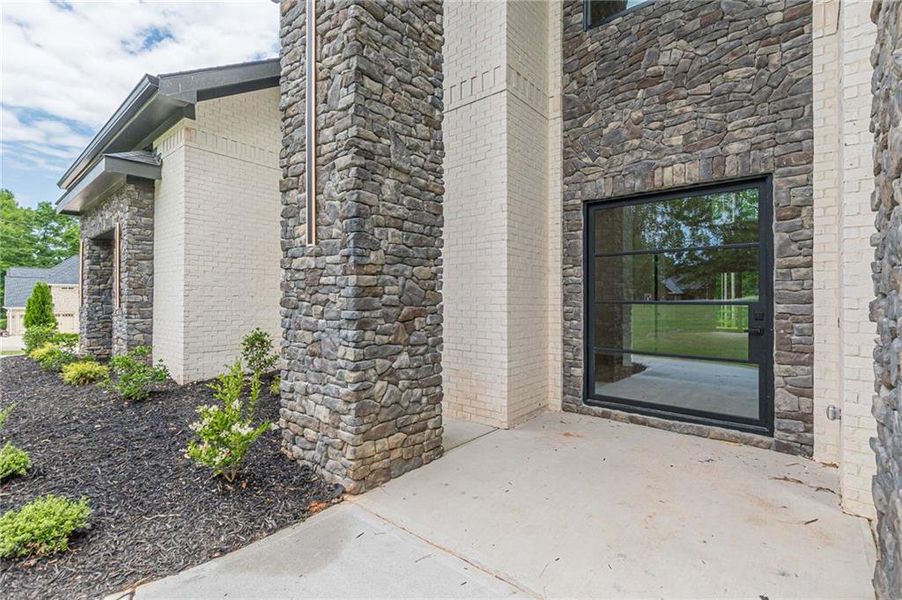 Exterior details and patio area of a home in , McDonough (Image 34).