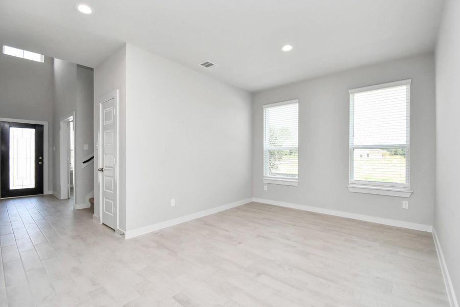 Another view of dedicated dining room. Sample photo of completed home with similar floor plan. Actual colors and selections may vary.