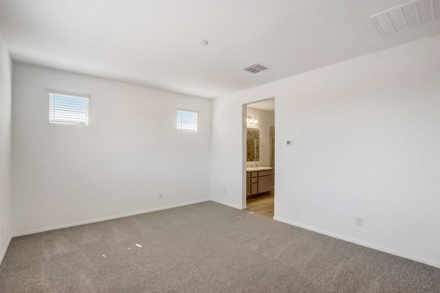 Representative unfurnished interior of a home built from the Larkspur by DRB Homes in The Villas at Mystic, Peoria (Image 13).