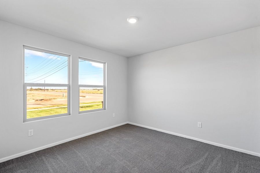 Representative unfurnished interior of a home built from the TEXAS CALI by D.R. Horton in Faculty Row, Abilene (Image 48).