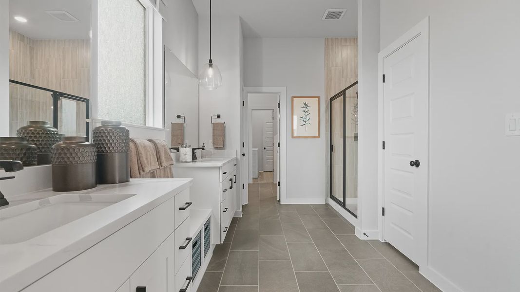 Representative furnished interior of a home built from the Wilson by Chesmar Homes in Lariat, Liberty Hill (Image 16).