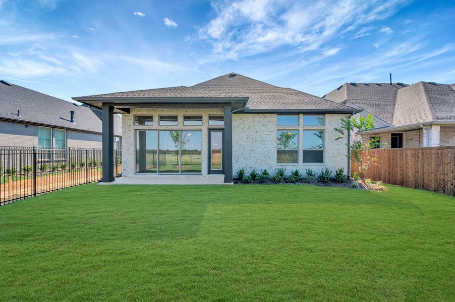 Exterior details and patio area of a home in Sandbrock Ranch, Aubrey (Image 3). Exterior details and patio area of a home in Sandbrock Ranch, Aubrey (Image 3).