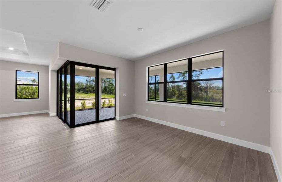 Spacious, unfurnished interior of a new home in Arbor Oaks, North Port (Image 19).