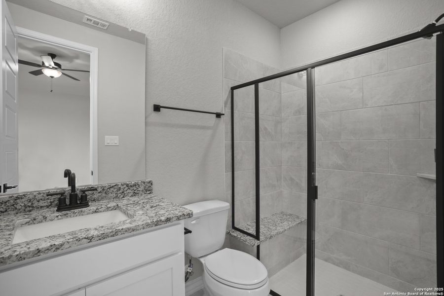 Furnished interior view inside a new home in Potranco Oaks, Castroville (Image 20).