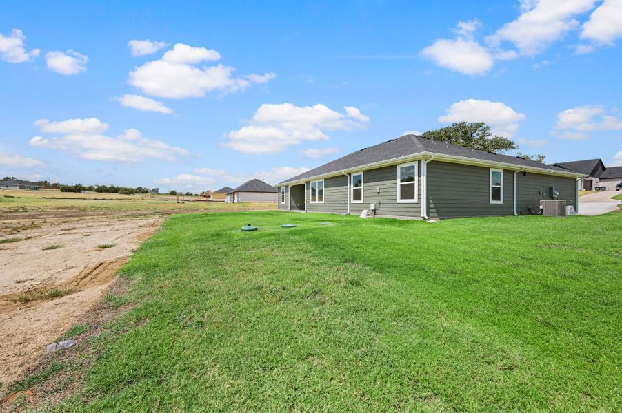 Exterior details and patio area of a home in Gatlin Ranch, Springtown (Image 20).