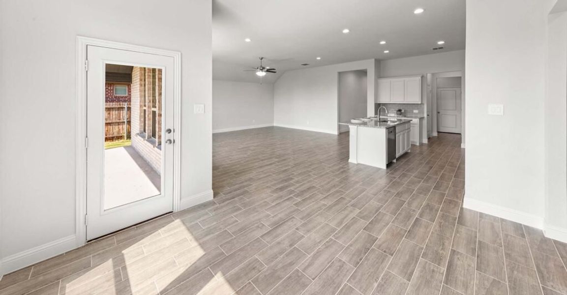 Representative exterior photo of a completed home built from the Hampton by Impression Homes in Still Water Lake, Godley, TX (Image 10). Representative exterior photo of a completed home built from the Hampton by Impression Homes in Still Water Lake, Godley, TX (Image 10).